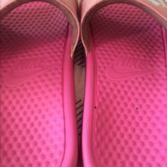 pink and blue nike slides